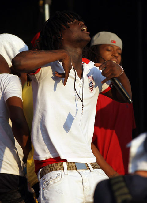 Chief Keef joins AraabMuzik on stage during Pitchfork Music Festival in Union Park in Chicago on Sunday, July 15, 2012.