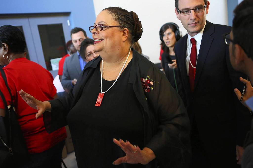 Chicago teachers union members, with president Karen Lewis, gather at the International Union of Operating Engineers union hall to announce a tentative agreement on a new contract.