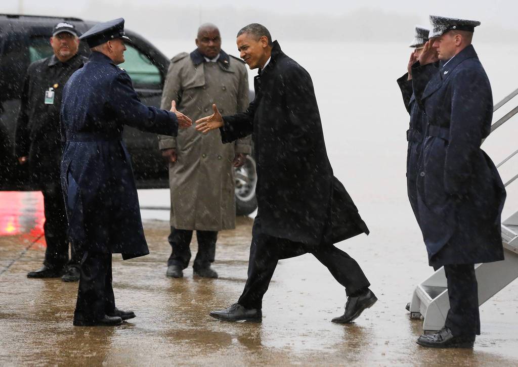 U.S. President Barack Obama arrives at Joint Base Andrews outside Washington after cancelling a campaign event in Florida due to bad weather in the Washington area. Obama canceled campaign events in Florida and Wisconsin to return to Washington on Monday and monitor the impact and response to Hurricane Sandy, the White House said.