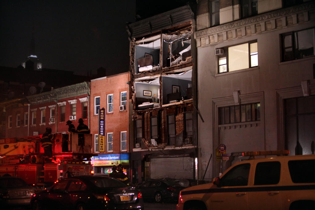 The facade of an apartment building collapsed in the Chelsea neighborhood of Manhattan, New York. Hurricane Sandy, which threatens 50 million people in the eastern third of the U.S., is expected to bring days of rain, high winds and possibly heavy snow.