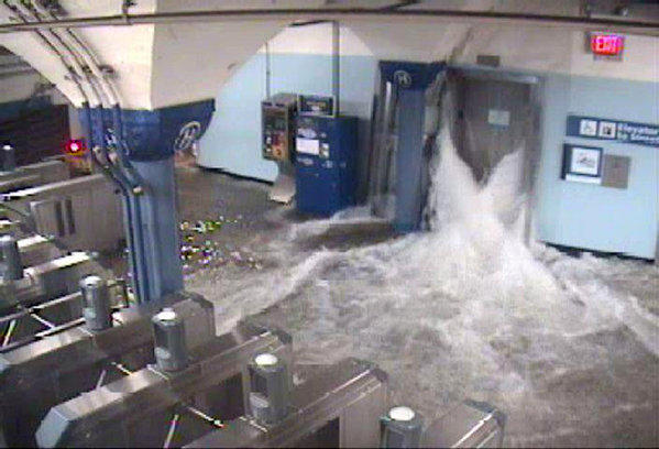 Floodwaters from Hurricane Sandy rush into the Port Authority Trans-Hudson's (PATH) Hoboken, New Jersey station through an elevator shaft, in this video frame grab from the NY/NJ Port Authority twitter feed October 29, 2012.