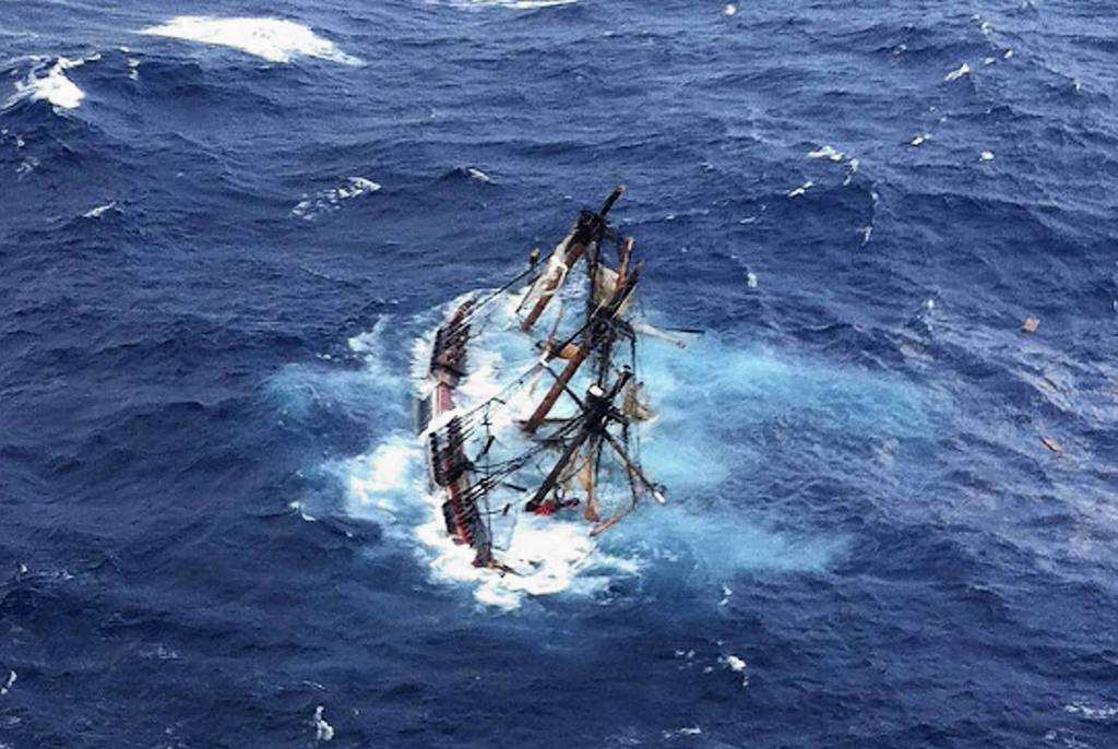The HMS Bounty, a 180-foot sailboat, is submerged in the Atlantic Ocean during Hurricane Sandy approximately 90 miles southeast of Hatteras, North Carolina. Of the 16-person crew, the Coast Guard rescued 14, recovered a woman who was later pronounced dead and are searching for the captain. The HMS Bounty was built for the 1962 film Mutiny On The Bounty and was also used in Pirates Of The Caribbean.