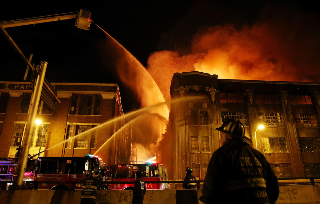 Firefighters battle a 5-11 blaze at 3757 South Ashland Ave. in the Bridgeport neighborhood of Chicago.