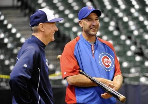 Cubs manager Dale Sveum (right) greets Brewers manager Ron Roenicke before the game.