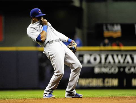 Cubs shortstop Starlin Castro reacts after committing an error.