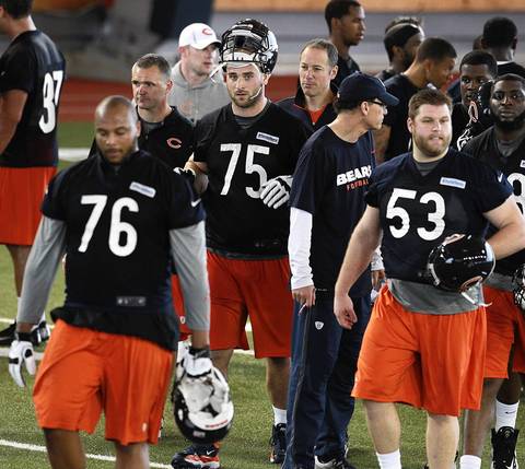 First round draft pick Kyle Long (75) makes his way to some scrimmage line drills.