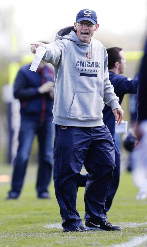 Bears coach Marc Trestman shouts instructions during drills.