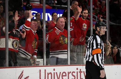 Blackhawks fans yell at a referee after a goal was disallowed for the Blackhawks in the third period.