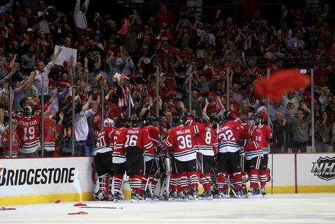 The Blackhawks celebrate after their overtime victory in Game 7.