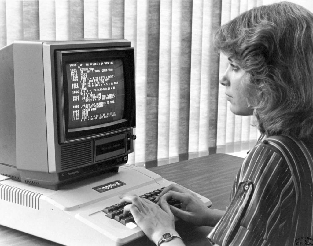 Robin Koch creates a program on an Apple II Plus computer.