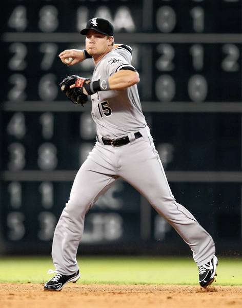 Gordon Beckham throws to first base to retire the Astros' Ronny Cedeno in the fourth inning at Minute Maid Park.