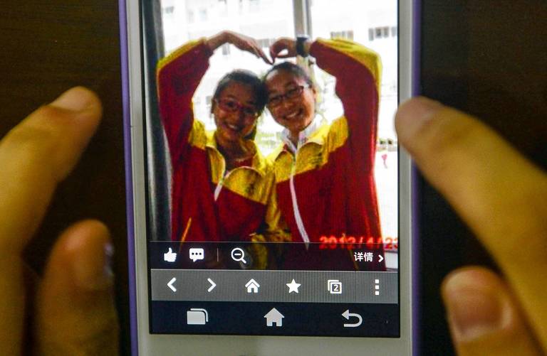 A picture of Wang Linjia, right, and Ye Mengyuan at Jiangshan Middle School in Jiangshan, east China's Zhejiang Province. The two girls were killed in the crash landing of an Asiana Airlines Boeing 777 at the San Francisco airport on Saturday morning. Their family members headed for the United States on Monday.