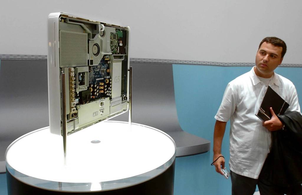 Apple iMac is displayed with its innards exposed at the Apple Expo in Paris on the day of its launch.