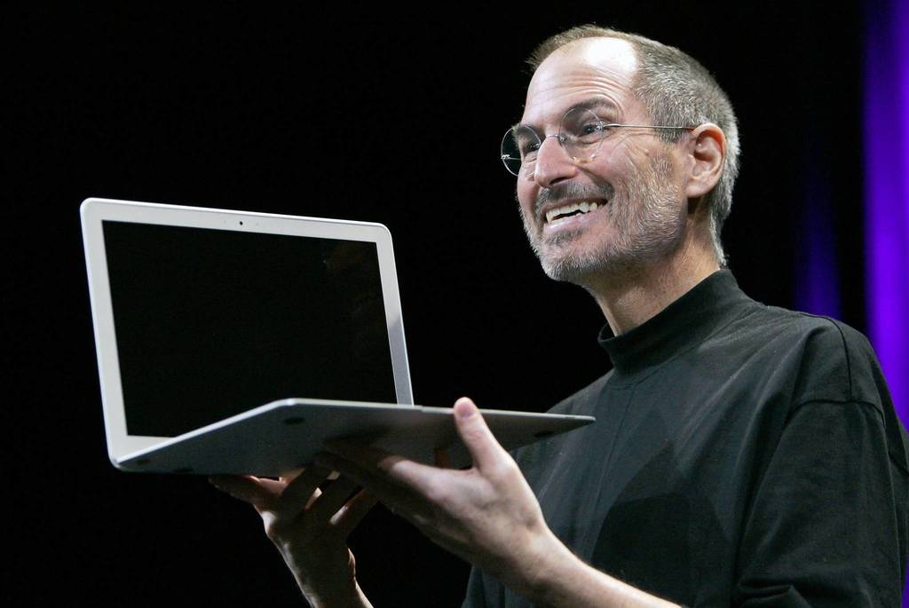 Apple Inc CEO Steve Jobs shows the new MacBook Air during the MacWorld Convention and Expo in San Francisco.