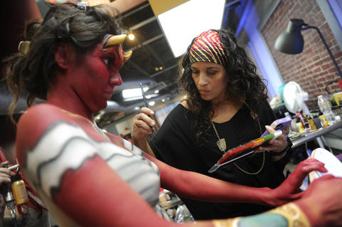 Heather Aguilera paints a model. The devilish pirate will appear in the video for The James Douglas Show's new song "Vegas Hot," which will premiere Nov. 5 when the "Naked Vegas" episode airs.
