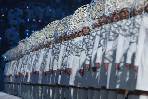 Performers take part in the 2014 Sochi Winter Olympics Closing Ceremony.