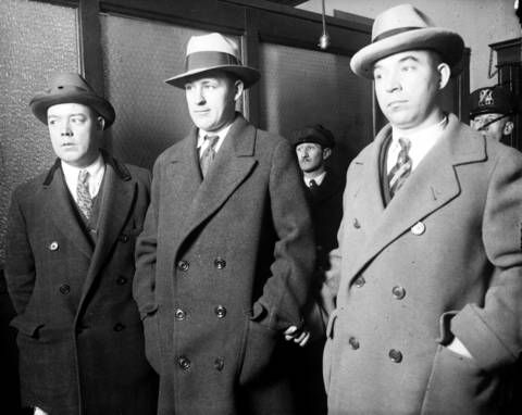 Martin Durkin, center, in custody of detectives, circa March 6, 1926. Durkin was the first person to kill a federal agent.