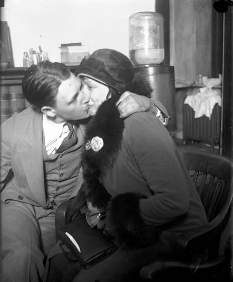 Martin Durkin kisses his mother Hattie Durkin during his trial for killing a federal agent, circa Jan. 24, 1926.