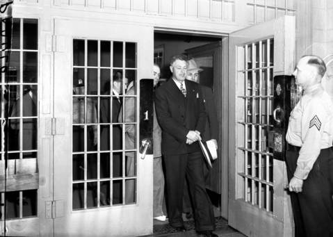 Martin Durkin, 44, circa Aug. 8, 1945, was released from Stateville penitentiary after serving 19 years for the murder of FBI Agent Edwin Shanahan. Durkin was immediately rearrested and transferred to Leavenworth Prison to serve 15 years for violation of the Dyer Act, a federal crime.