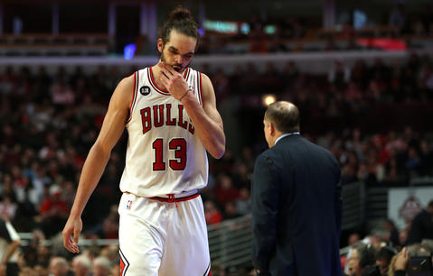 Joakim Noah walks to the bench during a break in the action in the fourth quarter at the United Center.