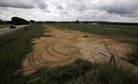A farm field remains where German prisoners of war were interned following the D-Day landings in Normandy in Nonant-le-Pin, France, August 24, 3013.