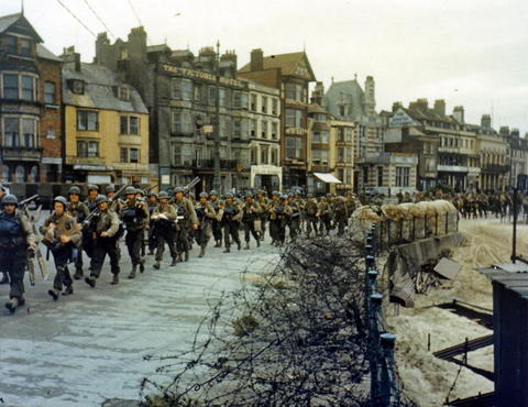 The 2nd Battalion U.S. Army Rangers, tasked with capturing the German heavy coastal defense battery at Pointe du Hoc to the west of the D-Day landing zone of Omaha Beach, march to their landing craft in Weymouth, England, on June 5, 1944.