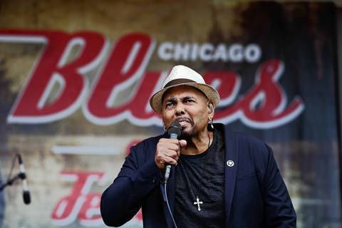 Aaron Neville, of the Aaron Neville quintet, performs at the Petrillo Music Shell on the final day of the 31st annual Chicago Blues Festival at Grant Park.