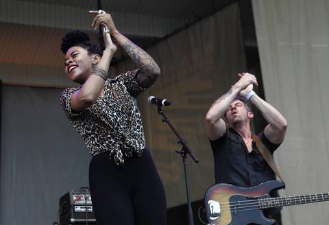 Nikki Hill, left, performs at the Petrillo Music Shell on the final day of the 31st annual Chicago Blues Festival at Grant Park in Chicago.