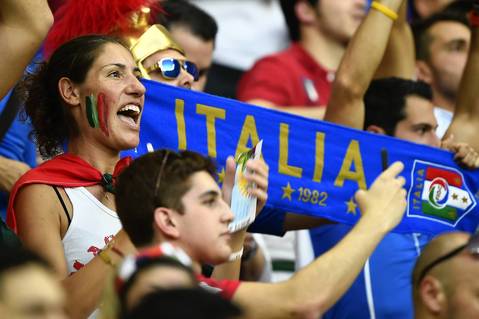 Italy fans sing their national anthem before a Group D football match between England and Italy at the Amazonia Arena in Manaus.