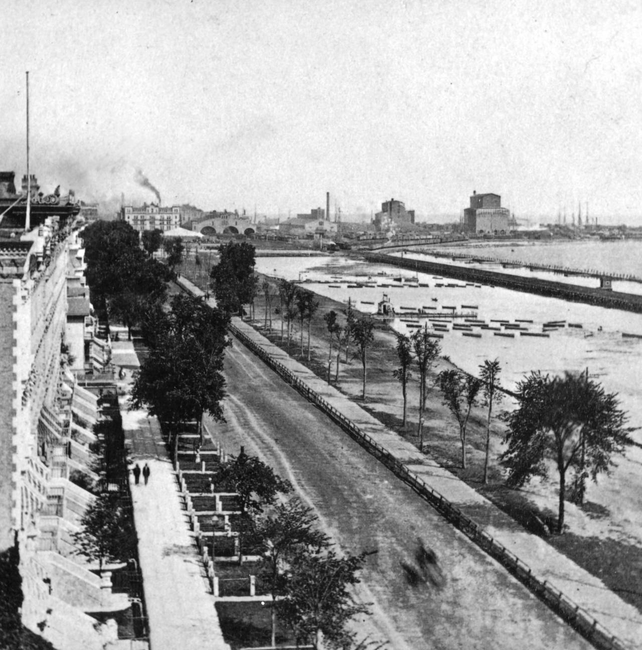 Looking north on Michigan Avenue in 1868, with the homes of prosperous businessmen on the left. Grant Park was nothing more than a marsh-filled lagoon, with rail lines on the right, between Lake Michigan and the lagoon-like area. The estimated vantage point of this photo is from where Congress Avenue is now located.