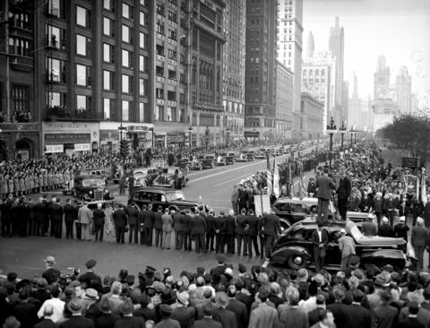 Cardinal Mundelein's funeral procession traveled from Holy Name Cathedral, east on Pearson Street, and south on Michigan Avenue to Monroe Street and then east to Lake Shore Drive, where the Cardinal's body would be brought to St. Mary of the Lake Seminary for its final resting place on Oct. 6, 1939.