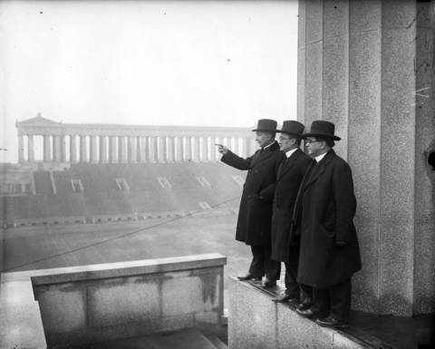 Cardinal Mundelein, from left, Father William R. Griffin, and Msgr. C. J. Quille look over Soldier Field in preparation for the upcoming 28th International Eucharistic Congress, circa Dec. 24, 1925. The congress was held in Chicago from June 20-24 in 1926 and was hosted by Cardinal Mundelein. The large, open-air mass was held at Soldier Field.