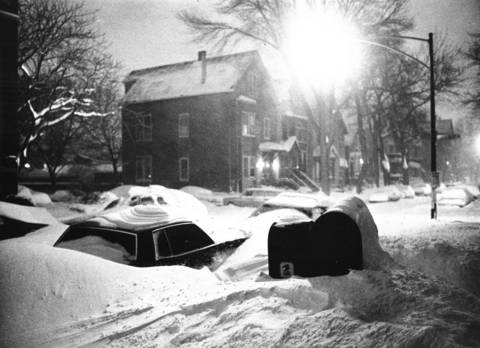Cars on North Mildred Avenue lie buried under the 18.8 inches of snow that fell on Jan. 12-13, 1979, the city's second-worst storm.