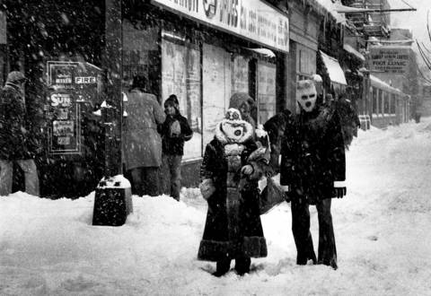 People wear face masks to stay warm while walking through a blizzard at Foster Avenue on January 13, 1979.