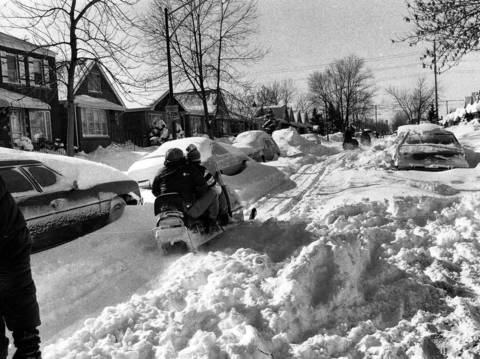 Snowmobiles go where autos can't in a South Side neighborhood on January 14, 1979.