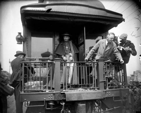 Chicago Mayor Dever welcomed Cardinal Mundelein upon his arrival home to Chicago at Garfield Blvd. and the Baltimore and Ohio train tracks on May 11, 1924. Mundelein was returning from Rome where he was appointed Cardinal by Pope Pius XI.
