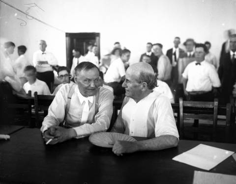 Clarence Darrow, left, and William Jennings Bryan at the Rhea County Courthouse during the Scopes trial in July 1925. The packed courthouse was said to be so warm that the judge moved the whole courtroom outside for a one-day reprieve.