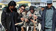 U.S. troops posed with body parts of Afghan bombers