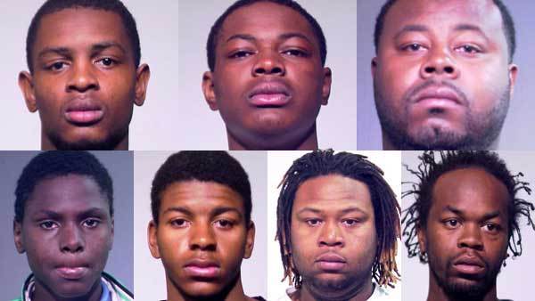 Police released booking photos of the following -- top row, from left: Jontae Adams, Derick Coopwood,Geonne Crew; bottom row, from left: Troy Harris, Michael Raggs, Jermaine Rose, Quentin Scott. (Chicago police)