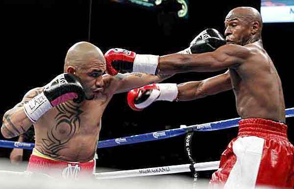 Miguel Cotto, Floyd Mayweather Jr.
