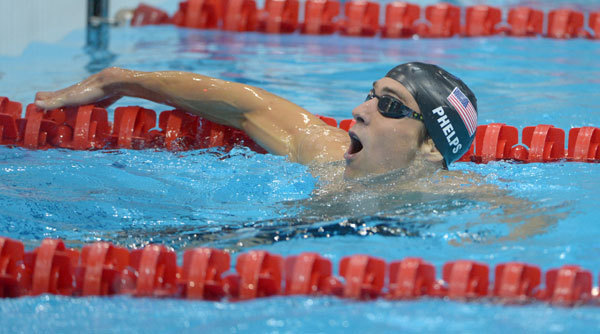 Michael Phelps denied gold in 100 butterfly; Katie Ledecky 
