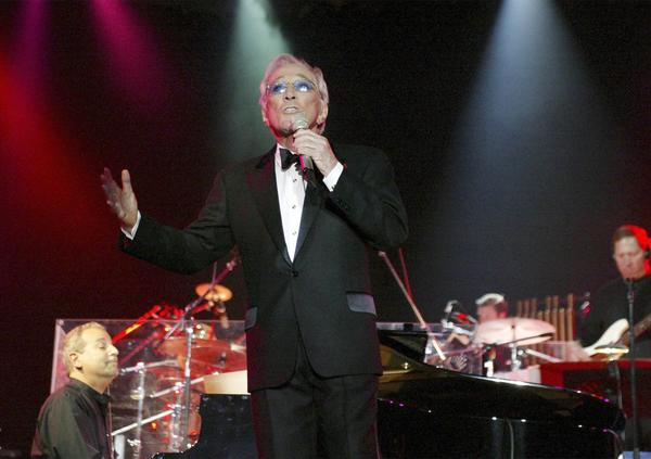 Andy Williams performs in 2004 in Bangkok, Thailand.