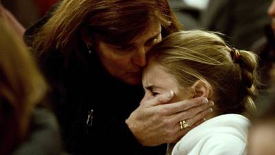 Newtown, Conn., grieves over massacre at elementary school
