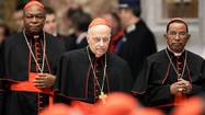 Cardinals George of the U.S., Toppo of India and Wako of Sudan arrive for a prayer at Saint Peter's Basilica in the Vatican