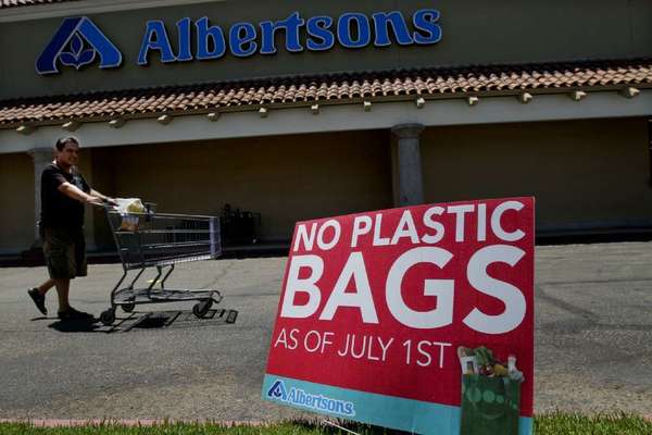 A sign outside a Hacienda Heights grocery store advises shoppers of the Los Angeles County ban on single-use plastic bags. The ban took effect July 1, 2011.