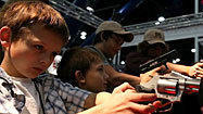 <b>Photos:</b> Locked and loaded at the NRA convention