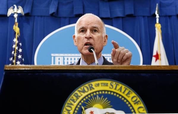 Gov. Jerry Brown responds to a question concerning his revised 2013-14 state budget plan during a news conference at the Capitol on May 14. 