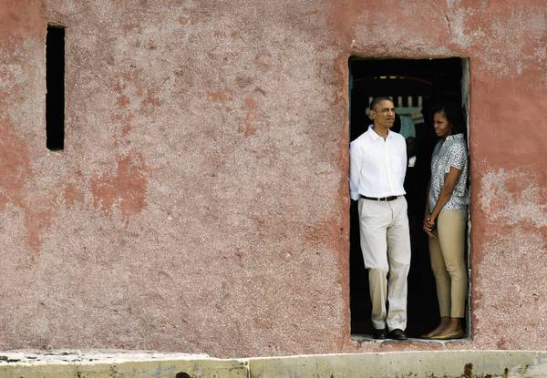 President Obama and First Lady Michelle Obama tour Goree Island slave house