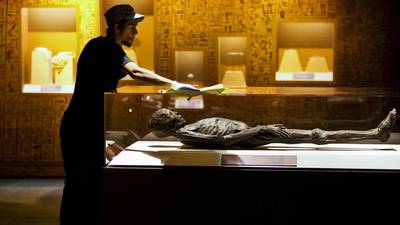 Mummies parade into museum