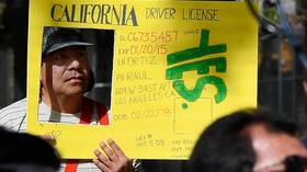 Latinos, whites split on immigrant laws OKd by Brown 